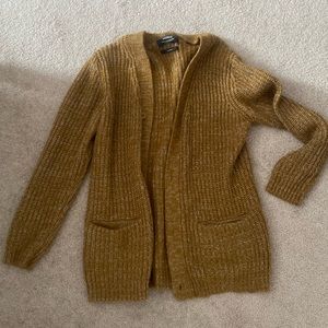 Indigo cardigan, full length sleeves, size large. Never been worn